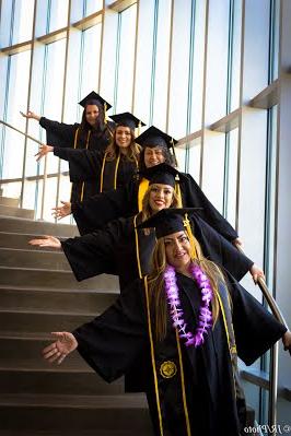 Graduates on staircase